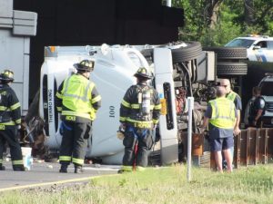 photo of semi rolled over